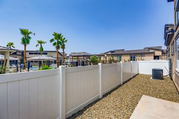 Apartments balcony and yard with palm trees